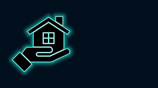 Glowing neon line House in hand icon isolated on black background. Insurance concept. Security, safety, protection, protect concept. 4K Video motion graphic animation — Stock Video