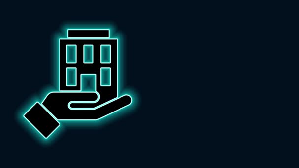 Glowing neon line House in hand icon isolated on black background. Insurance concept. Security, safety, protection, protect concept. 4K Video motion graphic animation — Stock Video