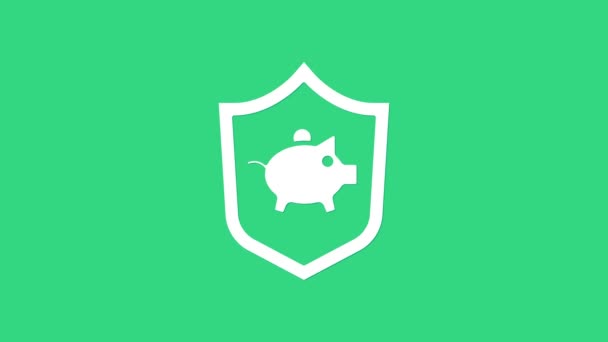Banco Piggy branco com ícone de escudo isolado no fundo verde. Economia de ícone ou acumulação de dinheiro, investimento. Animação gráfica em movimento de vídeo 4K — Vídeo de Stock