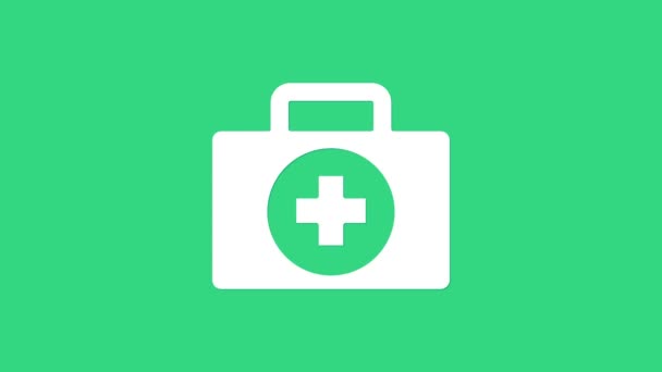 Icono del kit de primeros auxilios blanco aislado sobre fondo verde. Caja médica con cruz. Equipo médico para emergencias. Concepto de salud. Animación gráfica de vídeo 4K — Vídeos de Stock