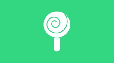 Beyaz lolipop simgesi yeşil arka planda izole edildi. Şeker işareti. Yemek, lezzetli bir sembol. 4K Video hareketli grafik canlandırması