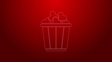 Kırmızı arka planda izole edilmiş karton kutuda yeşil çizgi patlamış mısır. Patlamış mısır kutusu. 4K Video hareketli grafik canlandırması