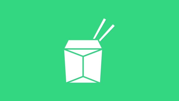 Karton kutuda beyaz Asya erişteleri ve yeşil arka planda izole edilmiş yemek çubukları ikonu. Sokak yemeği. Kore, Japon, Çin yemekleri. 4K Video hareketli grafik canlandırması — Stok video