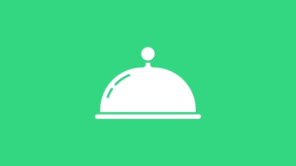 Белый Covered с иконой еды, выделенной на зеленом фоне. Поднос и знак крышки. Ресторан клош с крышкой. Видеографическая анимация 4K — стоковое видео