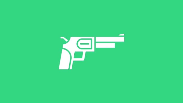 Белый значок оружия Revolver выделен на зеленом фоне. Видеографическая анимация 4K — стоковое видео