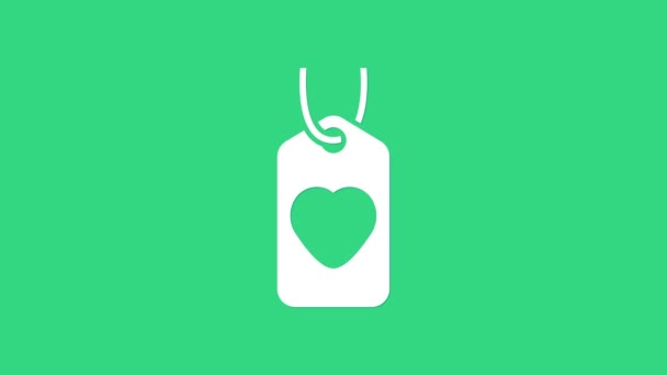 Icono de etiqueta Corazón blanco aislado sobre fondo verde. Símbolo de amor. Símbolo de San Valentín. Animación gráfica de vídeo 4K — Vídeo de stock