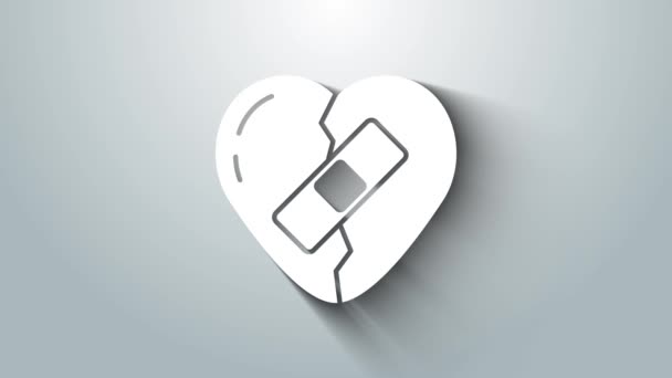 White Healed brustet hjärta eller skilsmässa ikon isolerad på grå bakgrund. Krossat och lappat hjärta. Kärlekssymbol. Alla hjärtans dag. 4K Video motion grafisk animation — Stockvideo