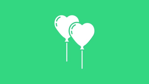 Białe balony w postaci serca z ikoną wstążki izolowane na zielonym tle. Walentynki. 4K Animacja graficzna ruchu wideo — Wideo stockowe