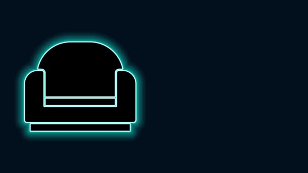 Glowing neon line Armchair icon isolated on black background. 4K Video motion graphic animation — Stock Video