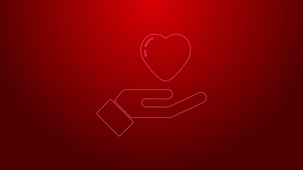 Зеленая линия Сердце в руке иконка выделена на красном фоне. Символ любви. Символ Дня Святого Валентина. Видеографическая анимация 4K — стоковое видео