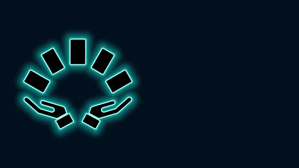 Glowing neon line Hand holding playing cards icon isolated on black background. Casino game design. 4K Video motion graphic animation — Stock Video