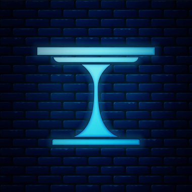 Parlayan neon yuvarlak masa simgesi tuğla duvar arkasında izole edilmiş. Vektör.