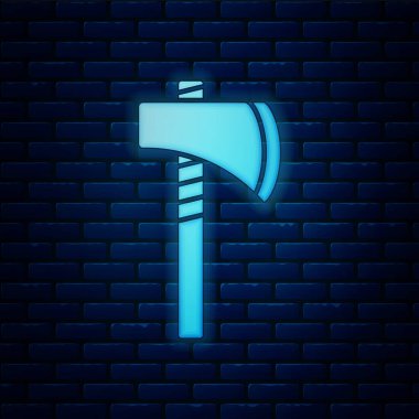 Parlayan neon renkli Amerikan yerlisi balta ikonu tuğla duvar arka planında izole edilmiş. Vektör.