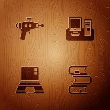 Kitap, ışın tabancası, dizüstü bilgisayar ve ahşap arka planda klavyeli monitör ayarla. Vektör.