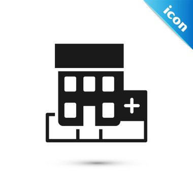 Beyaz arka planda çapraz ikonu olan gri tıp hastanesi binası. Tıp merkezi. Sağlık hizmetleri. Vektör.