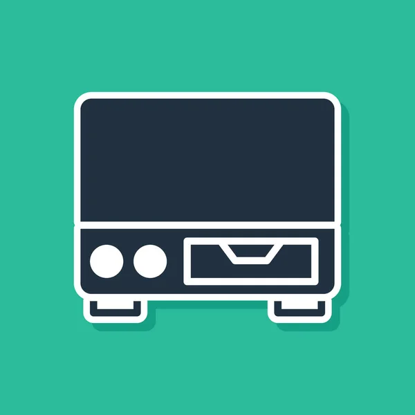 Blue Old video cassette player icon isolated on green background. Old beautiful retro hipster video cassette recorder. Vector — Stock Vector