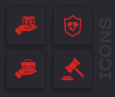 Set Judge gavel, House in hand, Life insurance with shield and Hand holding briefcase icon. Vector