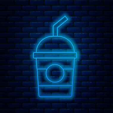 Parlayan neon hattı milkshake ikonu tuğla duvar arka planında izole edildi. Kapaklı ve samanlı plastik bardak. Vektör.