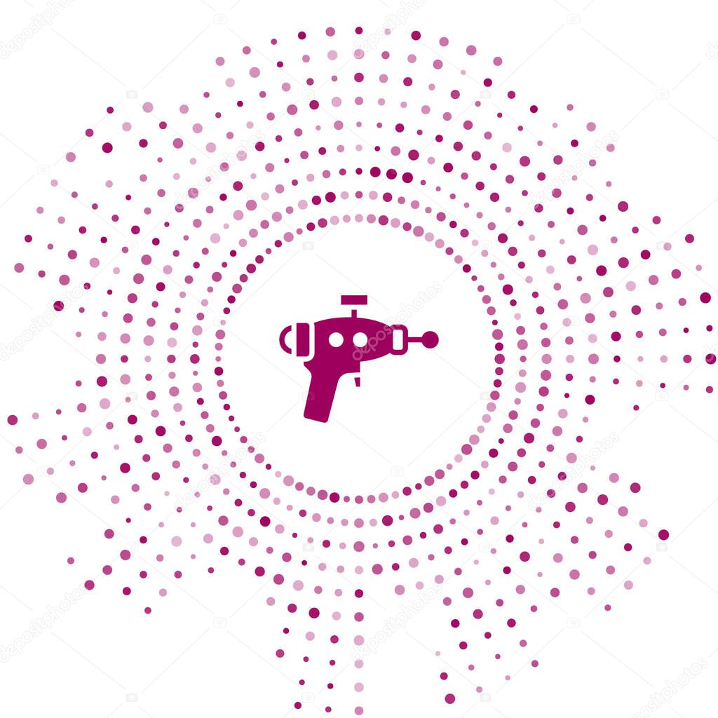 Purple Ray gun icon isolated on white background. Laser weapon. Space blaster. Abstract circle random dots. Vector