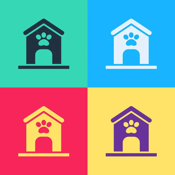 Pop art Dog house and paw print pet icon isolated on color background. Dog kennel. Vector — Stock Vector