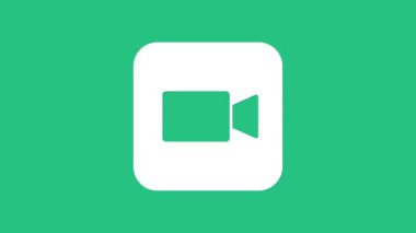 Beyaz Kamera simgesi yeşil arkaplanda izole edildi. Video kamera. Film tabelası. Film projektörü. 4K Video hareketli grafik canlandırması