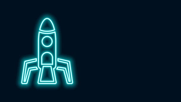 Glowing neon line Rocket ship icon isolated on black background. Space travel. 4K Video motion graphic animation — Stock Video