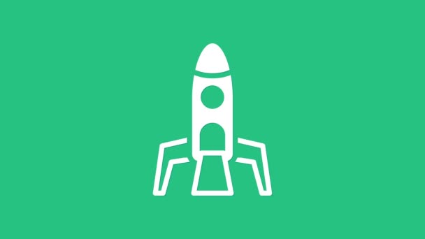 White Rocket ship icon isolated on green background. Space travel. 4K Video motion graphic animation — Stock Video