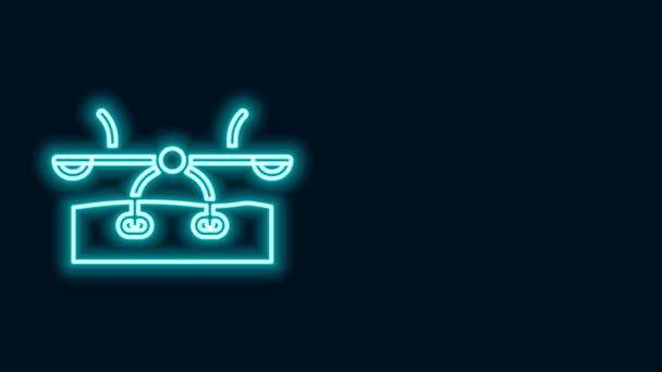 Glowing neon line Seesaw icon isolated on black background. Teeter equal board. Playground symbol. 4K Video motion graphic animation — Stock Video