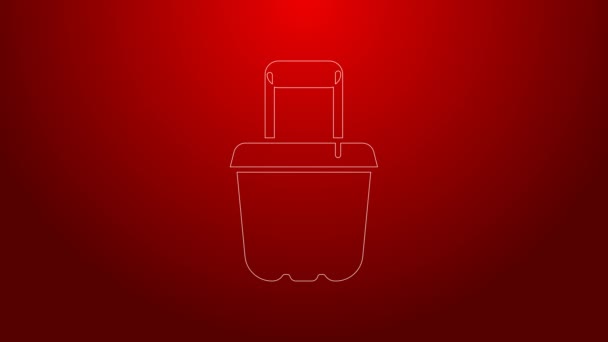 Zelená čára Písek v kbelíku ikona izolované na červeném pozadí. Plastová dětská hračka. Ikona léta. Grafická animace pohybu videa 4K — Stock video