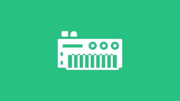 Icono sintetizador de música blanca aislado sobre fondo verde. Piano electrónico. Animación gráfica de vídeo 4K — Vídeos de Stock