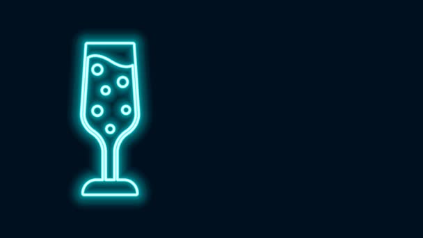 Glödande neon line Glas champagne ikon isolerad på svart bakgrund. 4K Video motion grafisk animation — Stockvideo