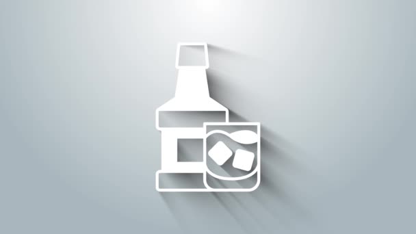 White Whiskey bottle and glass icon isolated on grey background. 4K Video motion graphic animation — Video Stock