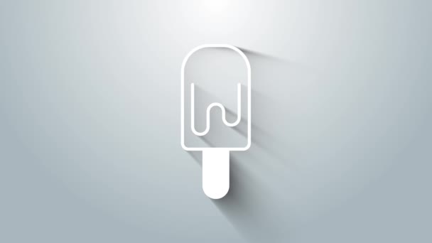 Helado blanco sobre icono de palo aislado sobre fondo gris. Dulce símbolo. Animación gráfica de vídeo 4K — Vídeo de stock