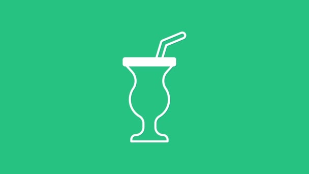 Witte Milkshake pictogram geïsoleerd op groene achtergrond. Plastic beker met deksel en rietje. 4K Video motion grafische animatie — Stockvideo