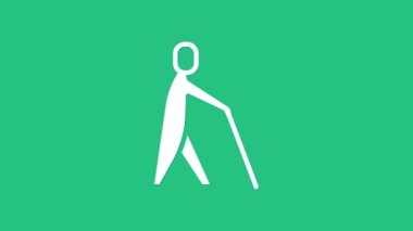 Beyaz Kör Tutma Çubuğu simgesi yeşil arka planda izole edildi. Körlüğü olan engelli bir insan. 4K Video hareketli grafik canlandırması