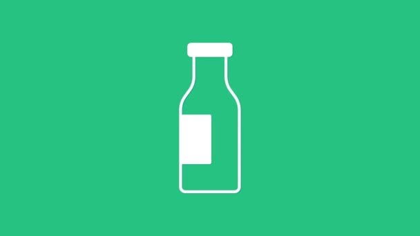 Blanco Botella de vidrio cerrada con icono de la leche aislada sobre fondo verde. Animación gráfica de vídeo 4K — Vídeo de stock