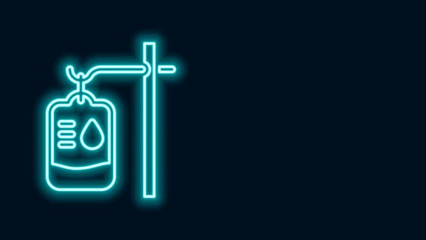Leuchtende Neon Line IV Tasche Symbol isoliert auf schwarzem Hintergrund. Blutbeutel. Blutspendekonzept. Das Konzept der Behandlung und Therapie, Chemotherapie. 4K Video Motion Grafik Animation — Stockvideo