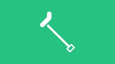 Yeşil arka planda beyaz baston ikonu var. 4K Video hareketli grafik canlandırması