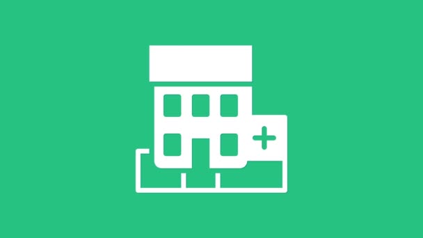 Yeşil arka planda çapraz ikonu olan beyaz tıp hastanesi binası. Tıp merkezi. Sağlık hizmetleri. 4K Video hareketli grafik canlandırması — Stok video