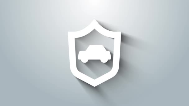 Coche blanco con icono de escudo aislado sobre fondo gris. Concepto de seguro. Seguridad, seguridad, protección, concepto de protección. Animación gráfica de vídeo 4K — Vídeo de stock