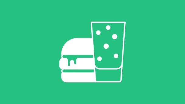 Белый значок на зеленом фоне. Икона гамбургера. Знак сэндвича с чизбургером. Меню быстрого питания. Видеографическая анимация 4K — стоковое видео