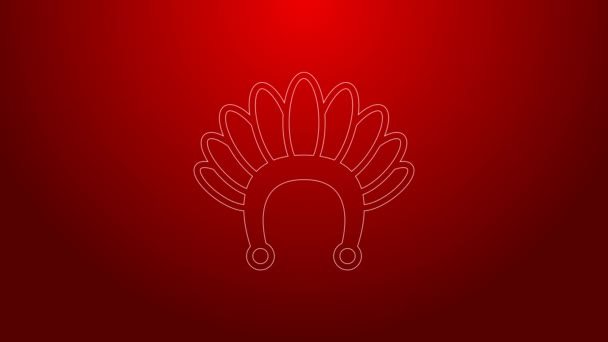 Tocado indio de línea verde con plumas icono aislado sobre fondo rojo. Tocado tradicional nativo americano. Animación gráfica de vídeo 4K — Vídeos de Stock