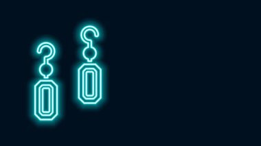 Parlayan neon çizgili küpe simgesi siyah arkaplanda izole edildi. Mücevher aksesuarları. 4K Video hareketli grafik canlandırması
