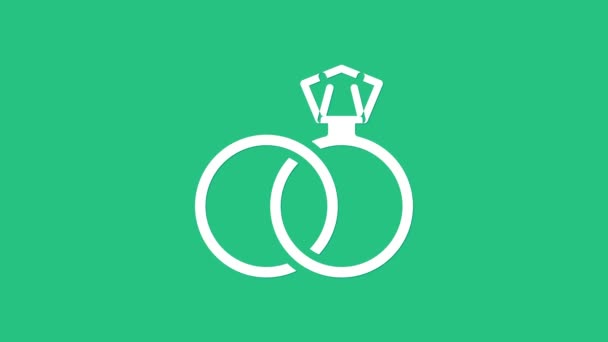 Icono de anillos de boda blancos aislados sobre fondo verde. Señal de joyería de novia y novio. Símbolo de matrimonio. Anillo de diamantes. Animación gráfica de vídeo 4K — Vídeo de stock
