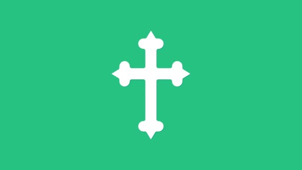 White Christian cross icon isolated on green background. Church cross. 4K Video motion graphic animation — Stock Video