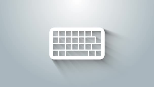 Значок клавиатуры белого компьютера выделен на сером фоне. Знак компонента ПК. Видеографическая анимация 4K — стоковое видео