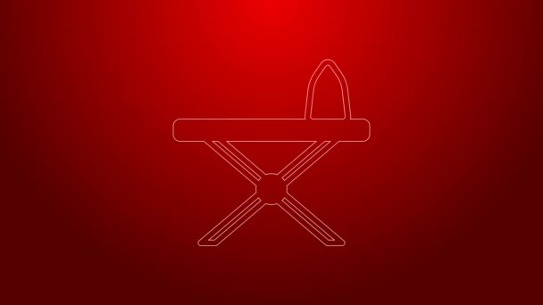 Green line Electric iron and ironing board icon isolated on red background. Steam iron. 4K Video motion graphic animation — Stock Video