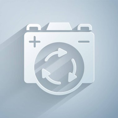 Paper cut Battery with recycle symbol icon isolated on grey background. Battery with recycling symbol - renewable energy concept. Paper art style. Vector