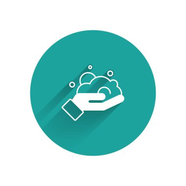 White Shaving gel foam on hand icon isolated with long shadow background. Shaving cream. Green circle button. Vector
