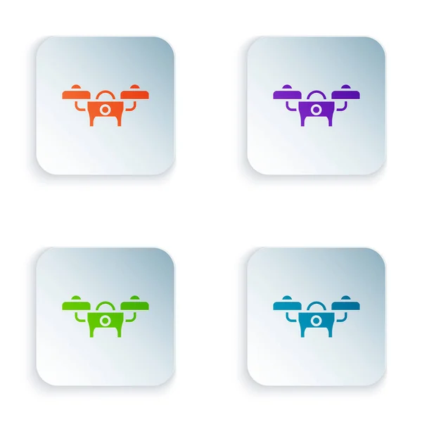 Color Drone icono de vuelo aislado sobre fondo blanco. Quadrocopter con video y el símbolo de la cámara fotográfica. Establecer iconos de colores en botones cuadrados. Vector — Vector de stock